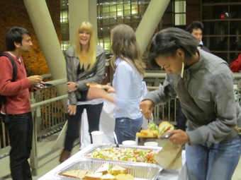 Pizza, sandwiches and salads at after-class reception.