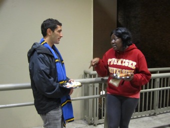 UCLA student and Tuskegee student exchanging thoughts and ideas.