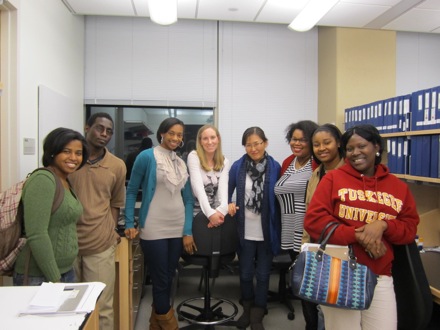 Tuskegee students pose with lab members Kelli and Jungim.