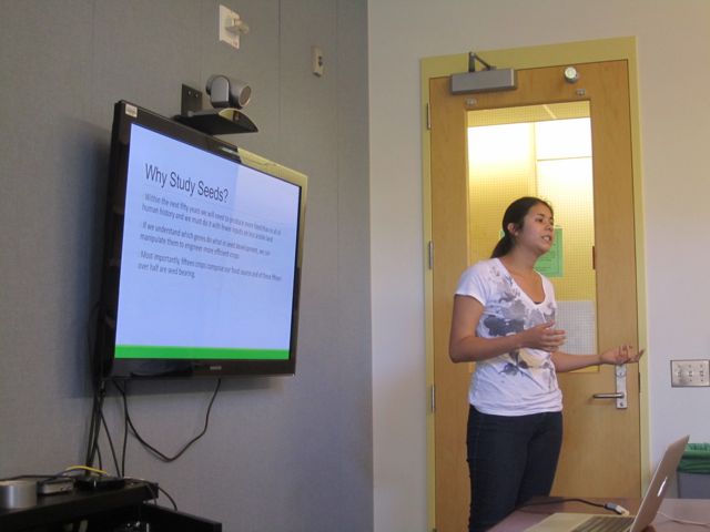 During the group presentation, Jazmin discusses the importance of understanding seeds.