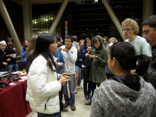 Dr. Pei Yun Lee interacts with students during reception.