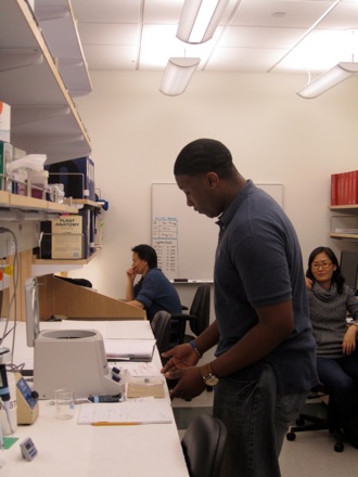 Antonio is eager for hands-on participation during DNA demo.