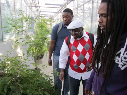 Tuskegee students tour the green house.