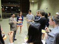 Students enjoy reception with Dr. Prakash.