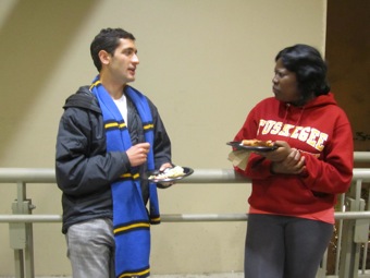 One-on-one discussion between UCLA and Tuskegee student.
