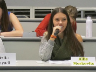 Allie asks Dr. Evans a question in lecture.