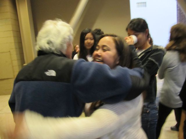 Melissa shows Professor Goldberg her appreciation with a big bear hug.