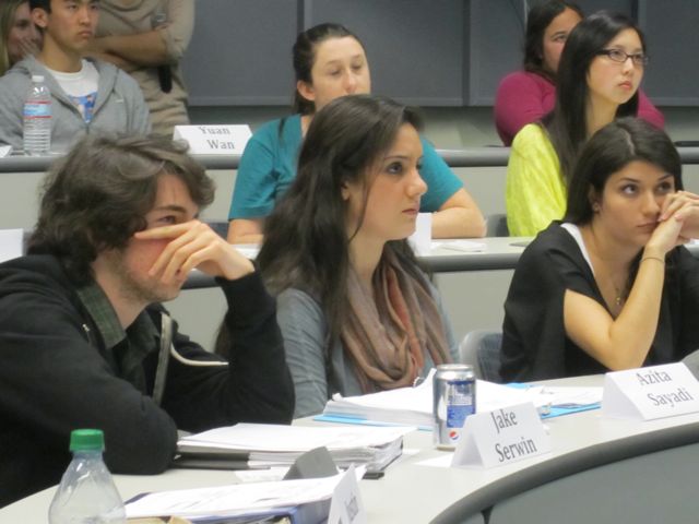 Jake, Azita, and Stephanie have front seats to view real crime footage.