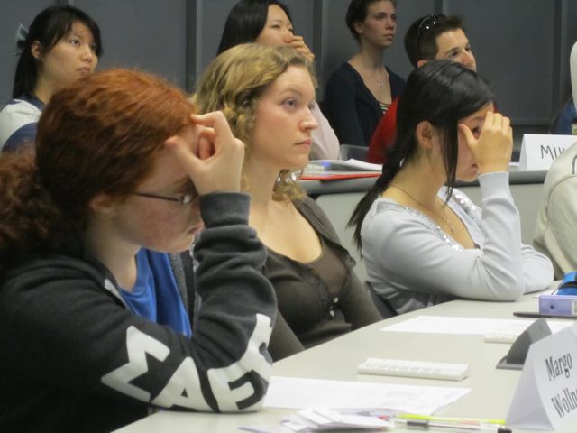 Students cover their eyes from viewing blood scenes.