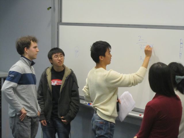 Yuan shows his calculations.