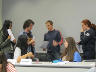 Michael summarizes the group's answer.