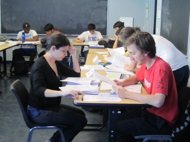 Students look over their assigned mock trial roles.