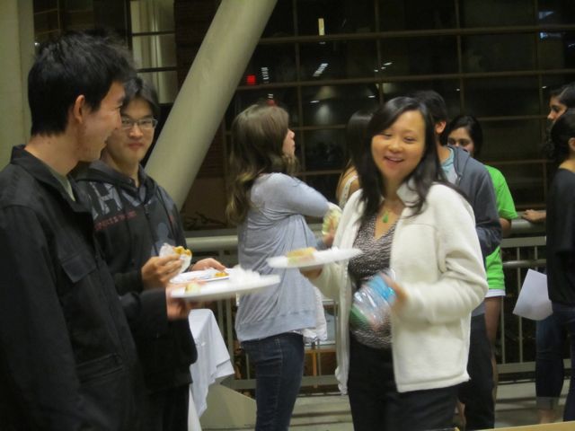 Justin, Bob, and Dr. Pei Yun Lee have one-on-one laughs. 