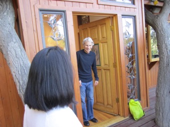 Bob welcomes everyone into his house.